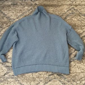 Blue turtleneck sweater from aerie. Size is a small, and it’s very small.